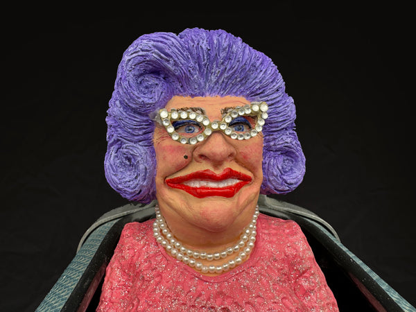 Dame Edna In her Electrolux Flier • Chris Towle